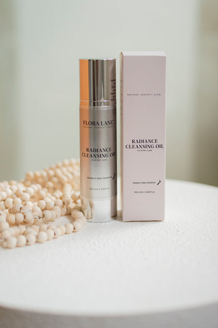 Flora Lane Radiance Cleansing Oil applied to skin